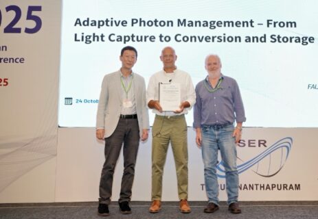 Prof. Guldi between Trevor Smith and Prof. Edwin Yeow